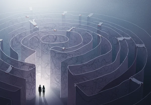 A couple in a labyrinth, symbolizing relationship challenges from CPTSD.